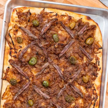 flatbread with caramelized onions, with olived and anchovies on top